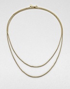 A baby box chain necklace in radiant 18k gold. 18k goldLength, about 32Lobster clasp closureImported 