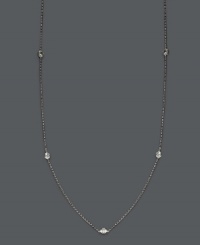 Add sparkle and shine by the inch. Trio by Effy Collection's stunning necklace features seven stations of round cut, bezel-set diamonds (5/8 ct. t.w.) strung from a delicate, 14k white gold chain. Approximate length: 24 inches.