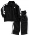 Your little guy will be comfortable and looking very sporty on the field or while running errands with you wearing this track jacket and pant set from adidas.