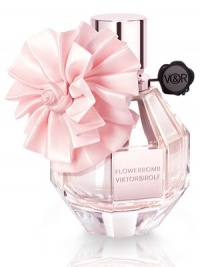 Flowerbomb is a floral explosion, a profusion of flowers that has the power to make everything more positive. Flowerbomb dresses up in a whimsical pink pleated flower inspired by Viktor & Rolf couture. A gorgeous plasma effect reflects from the inside out giving Flowerbomb a sensational dimension to celebrate the holiday season. 1.7 oz. 