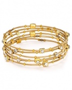 The Seasonal Whispers girl loves to stack the brand's beautifully eclectic bracelets. This set is studded with Swarovski crystal stations and gold tone inserts, creating a cool textured statement.