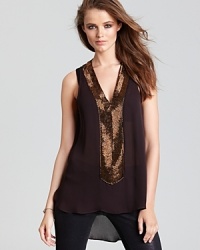 Copper beads illuminate this Aqua Luxe sheer blouse for a gorgeous look you can easily work through the day with jeans or at cocktails with tuxedo pants.