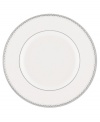 Start out any dinner in style with this fine china bread and butter plate. From innovative designer Monique Lhullier, it features a platinum-edged tiered scallop pattern on creamy white.