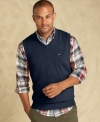 The perfect finishing touch to your preppy look is this sweater vest from Tommy Hilfiger layered over a plaid or oxford shirt.