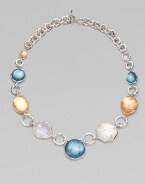 From the Wonderland Collection. Shapely doublets in rich tones of honey and denim combine color-backed mother-of-pearl and faceted clear quartz, spaced along with uncolored stones on a bold sterling silver chain.Mother-of-pearl and clear quartzSterling silverLength, about 18Toggle claspImported