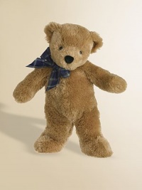 Soft, silky and oh so cuddly, this classic bear comes with a bright plaid bow tie. 17 high Polyester; surface clean Imported Recommended for all ages