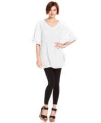 Add an elegant touch to leggings or skinny jeans with this lacy top from Style&co! Ruffles at the cuffs and hem add an extra feminine flourish. (Clearance)