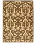 Safavieh takes classic beauty outside of the home with this elegant rug, created with a specially designed sisal weave. In deep chocolate brown with natural accents, this beautiful piece makes the most of any outdoor patio, porch or balcony. (Clearance)