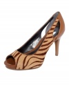 Completely sophisticated. Alfani's Kiley Step N Flex platform pumps feature sexy prints and trendy cutouts on the sides.