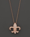 Diamonds set in a 14K. rose gold fleur-di-lis.