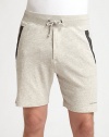 A sophisticated presence that doesn't sacrifice comfort, these cotton knit sweat shorts are sharpened by contrast detail at the pockets and signature logo detail.Drawstring waistSide slash, back welt pocketsInseam, about 6CottonMachine washImported