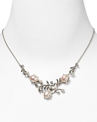 Take an elegant approach to accessorizing with this sterling silver and pearl frontal necklace from Judith Jack. With an intricate leaf and petal design it's a natural after-hours choice.