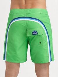 Comfortable, quick dry trunks have a lace-up waist and signature rainbow detail across the back and down the leg.Drawstring waistGrip-tape flyBack flap pocket with grip-tape closureInseam, about 7NylonMachine washImported