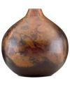 Finished by fire, each Burnished Copper vase is an individual. Rich earth tones and a unique mottled design distinguish the large, sculptural vessel for modern settings. By Donna Karan Lenox.