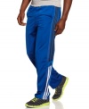 Look good on and off the court wearing these basketball pants by adidas.