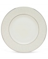 Pure opulence. Posh opalescence. This classically designed line of dinner plates from Lenox's dinnerware and dishes collection are accented by a platinum rim and a delicate flourish of vine-like, white-on-white imprints with raised, iridescent enamel dots. Great gift for housewarming, wedding or yourself. Dinner plate shown center.