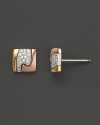 Diamonds shine in these modern tricolor gold stud earrings from Georg Jensen.