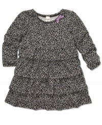 The flowing feel of this printed tunic from Osh Kosh make her style look extra sweet.