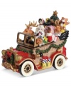 Full or surprises, St. Nick hits the road, piling Donner and Blitzen, teddy bears and toy planes into a classic car from Fitz and Floyd.