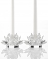 Votives in bloom. Lighting by Design Lotus blossoms brighten your home with warm, flickering candlelight and the resplendent shine of faceted crystal. A stunning pair for the dining room or holiday table.