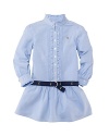 A classic oxford shirt is transformed into a precious dress with ruffled trim, pretty pintucks and gently puffed sleeves.