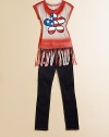 A patriotic take on a 70's-inspired design with fringed hem and floral American flag design for cool style.ScoopneckShort sleevesPullover styleFringed hemRayonHand washImported