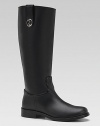 Tall leather riding boots with side zipper, leather tabs and metal, double G detailing.Side zipper and leather pull-on tabLeather upperFabric and leather liningLeather sole with anti-slip rubberPadded insoleMade in Italy