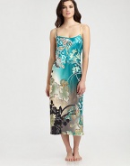 Lush flowers in tropical hues decorate this silky-smooth silhouette for a truly luxurious look. Wide scoopneckThin adjustable strapsAbout 46 from shoulder to hemPolyesterMachine washImported