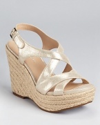 In sparkling suede, these Via Spiga wedges add a casual shimmer that lasts all day (and all night) long.