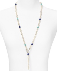 Round out your jewel box with this necklace from Majorica. This piece's organic pearls nod to subdued style, while turquoise, lapis and quartz beads are a bold injection of color.