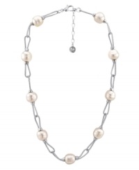 Polish your look with simple elegance. Majorica necklace features Baroque, organic, man-made pearls (14 mm) in a fluid sterling silver setting. Approximate length: 17 inches + 2-inch extender.