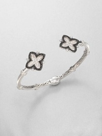 From the Soho Collection. This narrow design features white sapphire and black spinel accented clover-shaped end caps. White sapphiresBlack spinelSterling silverLength, about 7.5Slip-on styleImported 