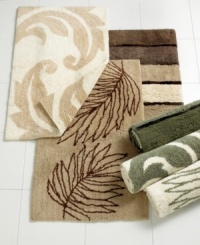 With a deep pile, earthy colors and garden-inspired designs, these decorative rugs from Charter Club are a beautiful addition to the natural bath. The Damask reversible rug features an abstracted leaf swirl both front and back. An illustration-like fern design makes a bold impression on the Beachfront rug. The Shimmer rug features multicolored wide stripes in neutral earth hues separated by dark brown bands of silky, shimmering threads.