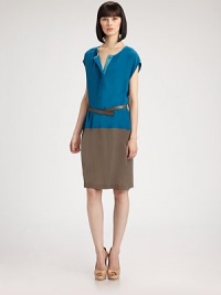 This colorblocked silk shirtdress style is accented with a skinny leather belt.Jewel necklineCap sleevesConcealed button placketIncluded leather beltDrop waistVented hemlineAbout 25 from natural waist68% silk/32% acetateDry cleanImported of Italian fabricModel shown is 5'9 (175cm) wearing US size 4. 