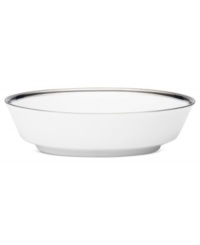 An instant classic, the Austin Platinum vegetable bowl from Noritake layers ribbons of black, patterned platinum bands and shimmering dots in white fine china.