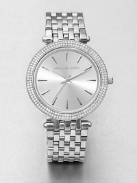 A sleek stainless steel timepiece accented with two rows of brilliant crystals on the bezel. Quartz movementWater resistant to 5 ATMRound stainless steel case, 39mm (1.5) Crystal accented bezelSilvertone dialBar hour markersSecond hand Stainless steel link braceletImported