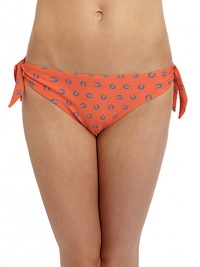 THE LOOKHorseshoe printElastic waist and leg openingsDecorative side ties with knot detailsTHE MATERIAL80% nylon/20% spandexFully linedCARE & ORIGINHand washImportedPlease note: Bikini top sold separately. 