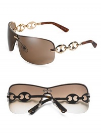 Rimless three-piece mount with marina chain temple. Available in gold frames with brown lens and chocolate frames with gray lens. Metal Made in Italy 