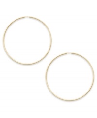 Forever stylish, forever chic. This pair of endless hoop earrings comes in 14k gold. Approximate diameter: 45 mm.