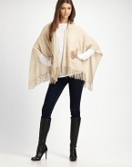 A casual style with an open drape front, warm hood and pretty fringe details in luxurious cashmere. HoodedOpen, draped frontPull-over styleFringed hemAbout 28 from back shoulder to hemCashmereDry cleanImported 