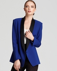 Your take on his luxe, this tux-inspired blazer features feminine details on a structured classic: shawl collar, faux front pockets, contrast silk lining peeking out from the cuffs.