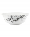 Subdued in shades of gray, the vivacious florals of Moonlit Garden dinnerware adorn this sleek serving bowl with modern romance. In durable Lenox porcelain.