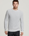 Cozy up to a hot cold-weather look from Michael Kors, a classic chunky sweater with allover ribbing and crewneck.