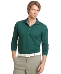 You'll play your best when you feel your best in this Izod golf shirt featuring moisture wicking and UV protection.