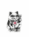 This pretty kitty boasts a red enamel heart collar. Charm by PANDORA.