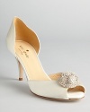 These ravishing evening pumps do retro right with fabulous jeweled accents on spectacular satin; by kate spade new york.