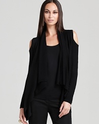 Revealing cold shoulders lend a dose of provocative edge to this DKNY cardigan for an effortlessly chic finish to any ensemble.