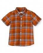 Check printed cotton in a warm orange hue adds grown-up charm to this Burberry shirt for boys.