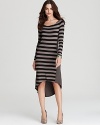 Bold stripes pack a graphic punch on this Ella Moss dress, tailored with long sleeves and a dramatic high/low hem.