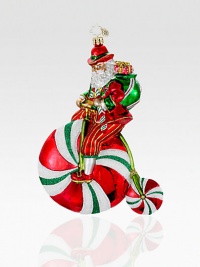 Handcrafted from vibrant European glass, Santa shakes things up by riding a glittery, candy-coated unicycle. Hand-blownHand-painted7 tallMade in Poland